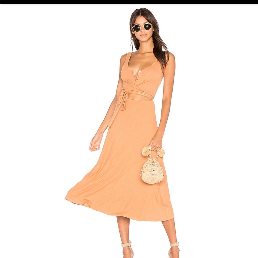 Fun coral dress for afternoon with friends or tropical vacation! Size S